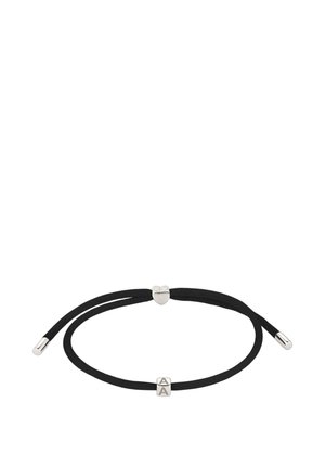 Black adjustable cord bracelet with small silver heart and square bead engraved with letter A on a white background.
