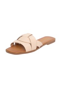 Sandale à enfiler beige avec des brides croisées, fabriquée en matériau synthétique lisse. Semelle plate avec une finition marron clair. Sans talon.