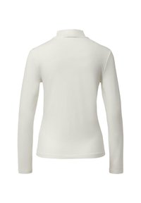 Lange mouwen, lichtbeige poloshirt gemaakt van zachte stof. Heeft een klassieke kraag en een slim fit ontwerp met een gladde textuur.