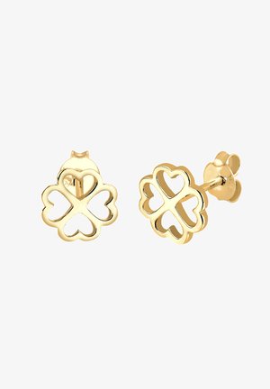 Boucles d'oreilles en forme de trèfle à quatre feuilles en ton or, avec des cœurs découpés, présentant une finition lisse et des fermoirs simples.