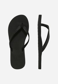 Mustad mustikud, millel on tekstuuriga, sädelev reguleeritav rihm, lame tall ja minimalistlik disain sujuvate äärtega.