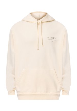 Crèmefärgad hoodie tillverkad av mjukt tyg. Har en kenguruficka, ribbad ärmslut och en justerbar dragsko i huvan. Logotyp tryckt på bröstet.