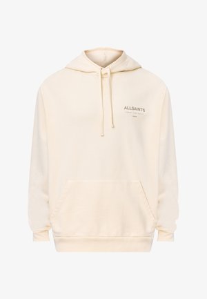 Cremefarvet hættetrøje lavet af blødt stof. Har en kengurulomme, ribbede manchetter og en justerbar snor i hætten. Logo trykt på brystet.