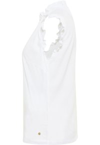 Top blanco sin mangas con mangas acampanadas, corte recto y un pequeño acento dorado cerca del dobladillo. Fabricado con una tela suave.