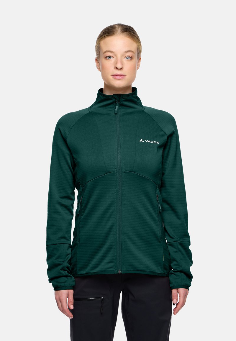 Giacca zip-up verde scuro in tessuto testurizzato, con colletto alto e due tasche laterali. Presenta un design minimalista e un logo bianco sul petto.