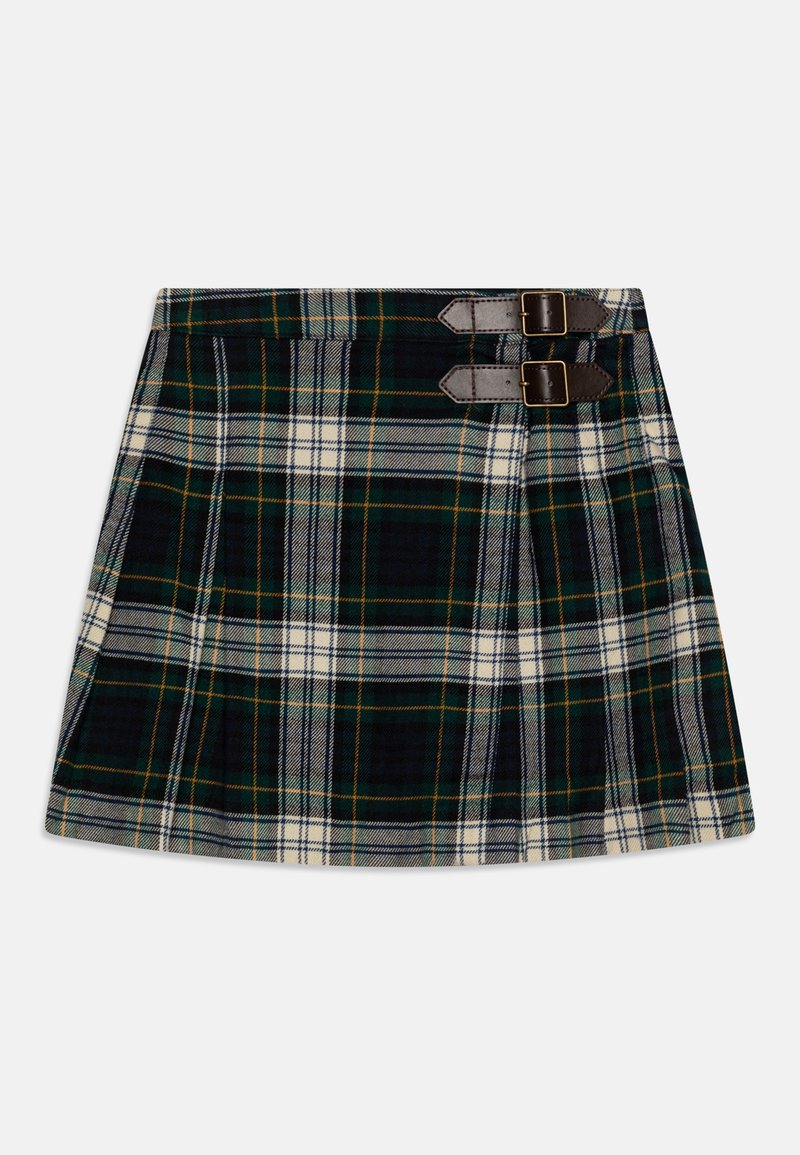 Jupe plissée tartan longueur genou en vert foncé, bleu marine et blanc avec deux brides marron à boucle à la taille.