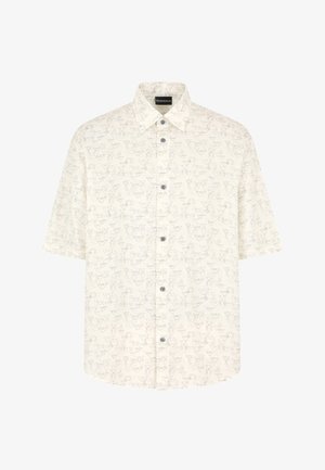 Camicetta a maniche corte con bottoni in crema, con un sottile motivo floreale. Presenta un colletto a punta e cinque bottoni sul davanti.