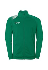 Green athletic jacket with a full zipper, featuring a textured geometric pattern on one shoulder and the "Kempa" logo in white.