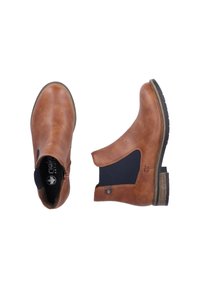 Bottines en cuir marron avec des panneaux latéraux élastiques, un talon empilé et un bout arrondi. Surface texturée avec un motif de grain subtil.