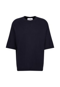Maglietta corta blu navy con un motivo testurizzato, scollatura rotonda e vestibilità rilassata, etichettata "studio" all'interno.