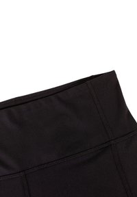 Zwarte hoge taille leggings van rekbaar materiaal, met een gladde textuur en subtiele stiksels langs de naden voor extra duurzaamheid.