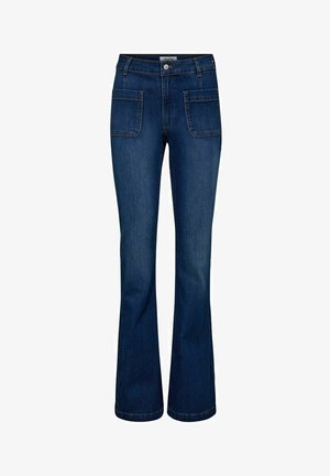 Tegen de klok in gesneden donkerblauwe denim jeans met twee voorkruiszakken, een knoopsluiting en contrasterende stiksels langs de naden.