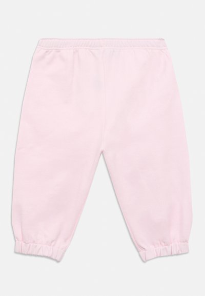 Ρόζ βαμβακερό παντελόνι φόρμας με ελαστική μέση και σούρες στα μπατζάκια, με λεία υφή και άνετη εφαρμογ ή.