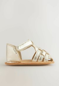 Metallic gold children's sandal with an open toe design, crisscross straps, and a hook-and-loop closure. Natural tan sole.