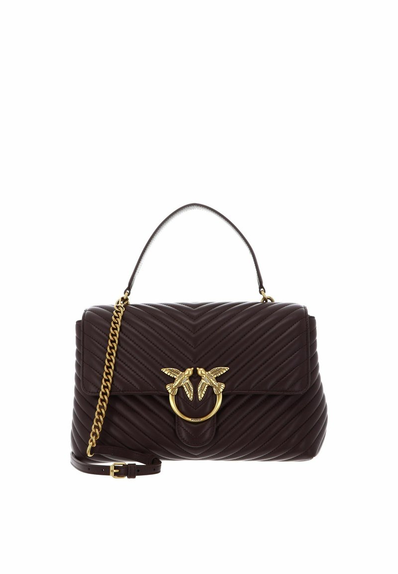 Sac à main en cuir matelassé marron avec une poignée supérieure, un ornement abeille en ton doré, et une bandoulière chaîne amovible.