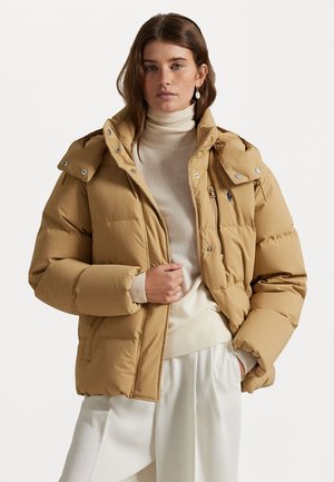 Khaki puffer jacket with a high collar, front zipper, snap closures, and side pockets. Features a quilted design and soft texture.