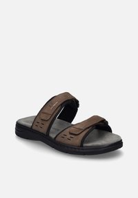 Sandalo in pelle marrone con due cinturini regolabili in Velcro, soletta imbottita e suola in gomma nera testurizzata; presenta fori per la ventilazione.