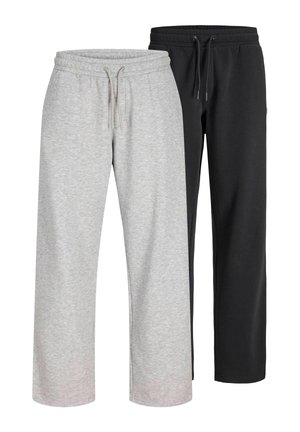 Deux paires de pantalons de survêtement, une gris clair et une noire, toutes deux avec taille élastique et cordons, présentées côte à côte sur un fond blanc.