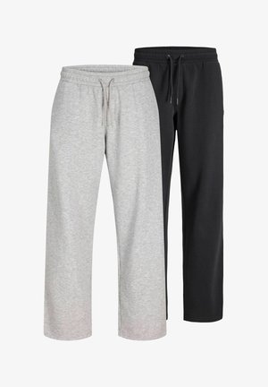 Deux paires de pantalons de survêtement, une gris clair et une noire, toutes deux avec taille élastique et cordons, présentées côte à côte sur un fond blanc.