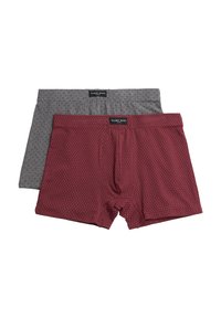 Dos pares de calzoncillos: uno gris con un pequeño patrón y otro rojo con un diseño de puntos. Ambos cuentan con una cómoda cinturilla.