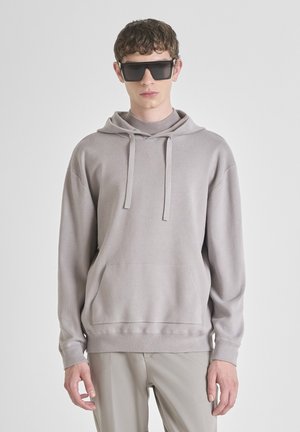 RELAXED  FIT - Jersey con capucha - beige