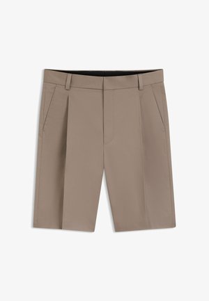 Beige knee-length tailored shorts with belt loops, front side pockets, and a clean, structured design.
