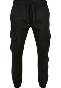 Pantaloni cargo neri con vita elasticizzata, coulisse, tasche a parete laterali, dettagli con zip e polsini elasticizzati.