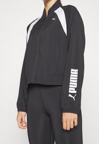 Puma Verryttelytakki - black