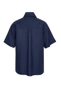 Camicia navy a maniche corte in lino, con taglio dritto, yoke sulla schiena e colletto classico. Tessuto liscio senza motivi.