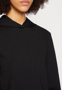 Calvin Klein Jeans MIXED MILANO HOODIE - Camiseta de manga larga - black