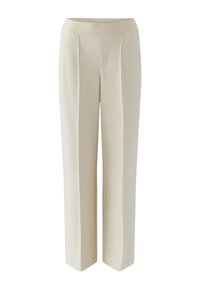 Cream-colored wide-leg trousers made of smooth fabric, featuring a waistband with embossed text and pleats for added detail.