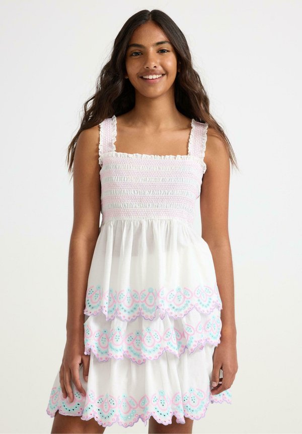 PEPLUM WITH EMBROIDERY - Bluse