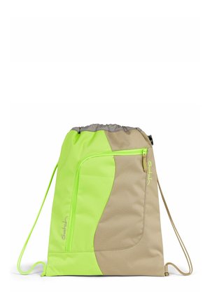 Drawstring backpack featuring a vibrant lime green and tan color scheme, made from durable fabric with a zippered front pocket and adjustable cords.
