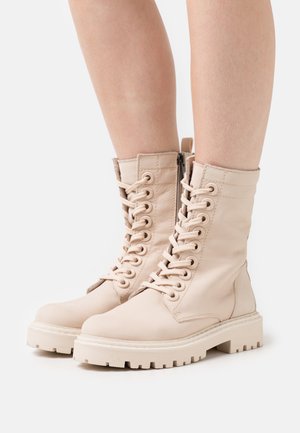 Marco Tozzi Platform ankle boots - cream