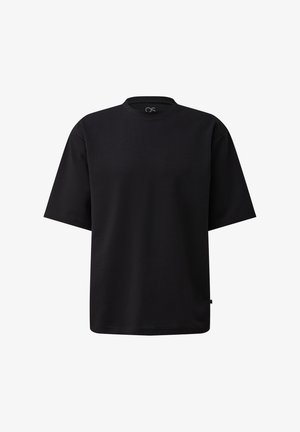 Czarny T-shirt z krótkim rękawem, o luźnym kroju, z okrągłym dekoltem i małą metką materiałową przy lewej bocznej szwie.