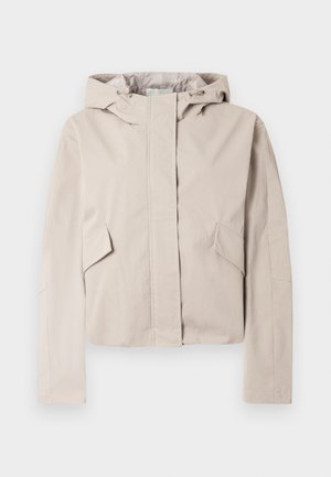 Lichtbeige cropped jas met capuchon, voorzien van een voorrits, twee schuine zijzakken en een gladde, gestructureerde stof.