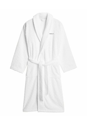 Accappatoio bianco in cotone strutturato con motivo a zigzag, dotato di collo sciallato, cintura in vita e due tasche frontali; logo del marchio sul petto.