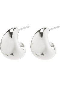 Boucles d'oreilles en métal argenté avec un design lisse et arrondi, offrant un éclat subtil, et dotées d'une fermeture par tige pour un port sécurisé.
