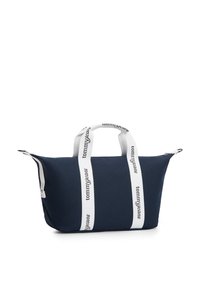 Μπλε καμβάς τσάντα ώμου με λευκές τιράντες που φέρει το κείμενο "tommy jeans". Ορθογώνιο σχήμα με δύο επάνω λαβές και κλείσιμο με φερμουάρ.