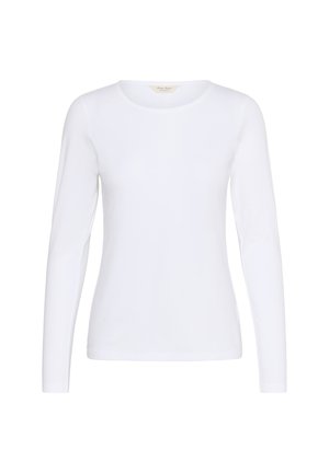Bluză cu mânecă lungă, gât rotund, de culoare albă. Confecționată dintr-un material moale și neted, cu o formă ajustată. Fără modele vizibile sau detalii metalice.