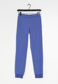 Blå joggerbyxor i ett mjukt, lätt material. Har elastisk midja och ribbade mudd; inkluderar sidofickor för förvaring.
