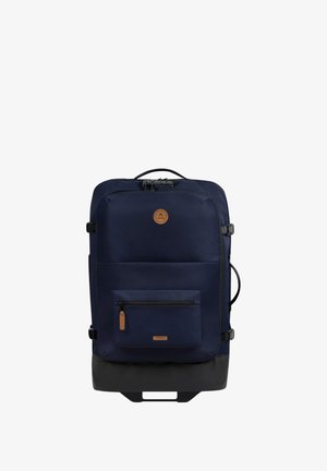 Navy blue backpack with a smooth fabric texture, featuring a large main compartment, front zip pocket, dark base, and brown leather accents.