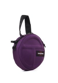 Pochette rotonda viola realizzata in tessuto resistente, dotata di manico superiore, chiusura con zip e una patch del logo Eastpak.