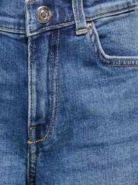 Hele sinised teksapüksid vasetooniga nööbiga, nähtava õmblusega ja tekstuuriga viimistlusega. Omab traditsioonilist viiepükste kujundust.