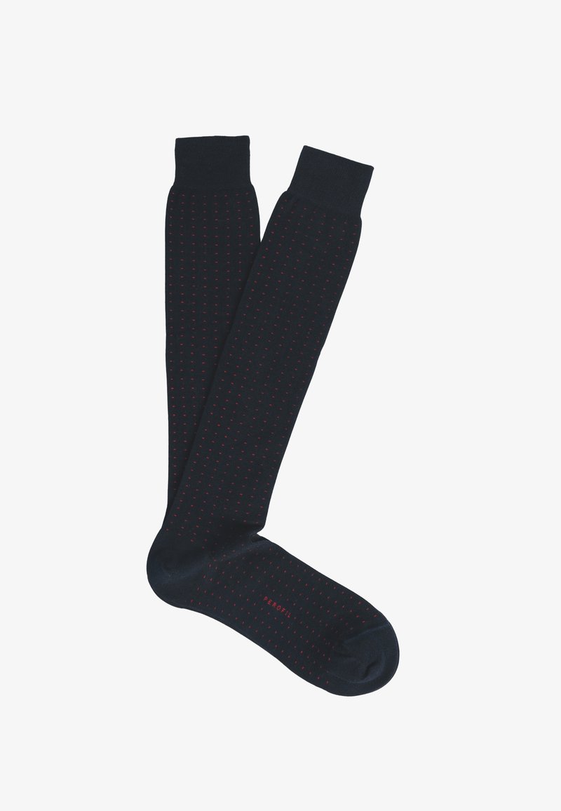 Calzini al ginocchio in blu navy scuro con un motivo a pois rossi. Realizzati in materiale morbido, presentano una punta rinforzata e una parte superiore a coste comoda.