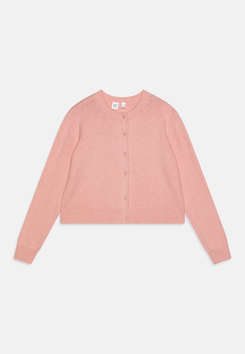 Rožinė trumpa megztinė, pagaminta iš minkštos mezginio medžiagos. Yra apvalus iškirpimas, ilgos rankovės ir sagų uždarymas priekyje.