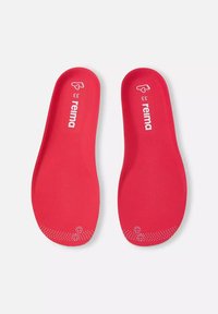 Paire de semelles rouges de la marque Reima, taille 33 indiquée, avec de petites icônes de pied et de cœur au niveau du talon.