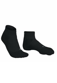 Calzini neri alla caviglia con texture a coste, punte rinforzate e vestibilità aderente. Presentano una suola imbottita per il comfort e un dettaglio logo di lato.