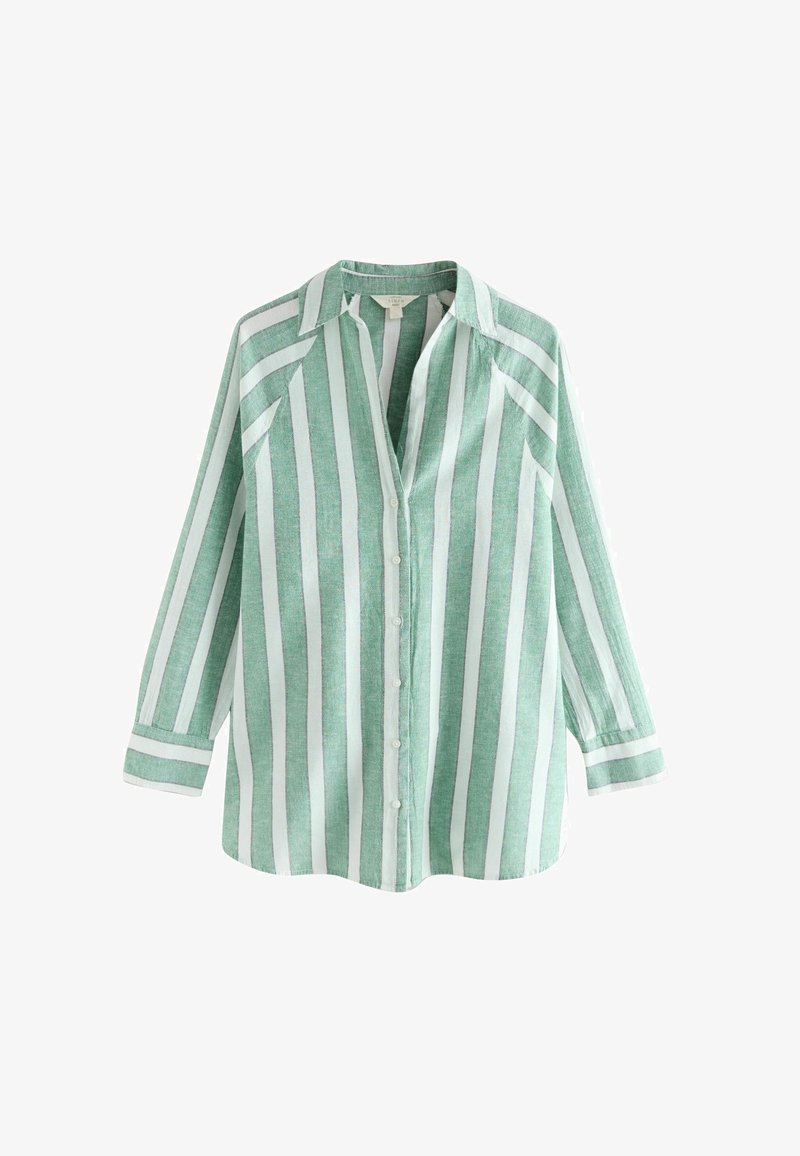 Zaļi un balti svītrota krekla ar garām piedurknēm, viegla auduma, izteikta apkakle un divām krūšu kabatām, ar taisnu apakšu.