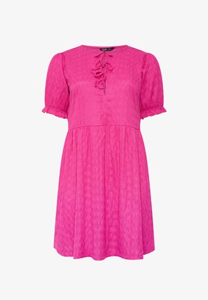 Bright pink textured short-sleeve dress with ruffle neckline ties, puff sleeves, and a gathered waistline.